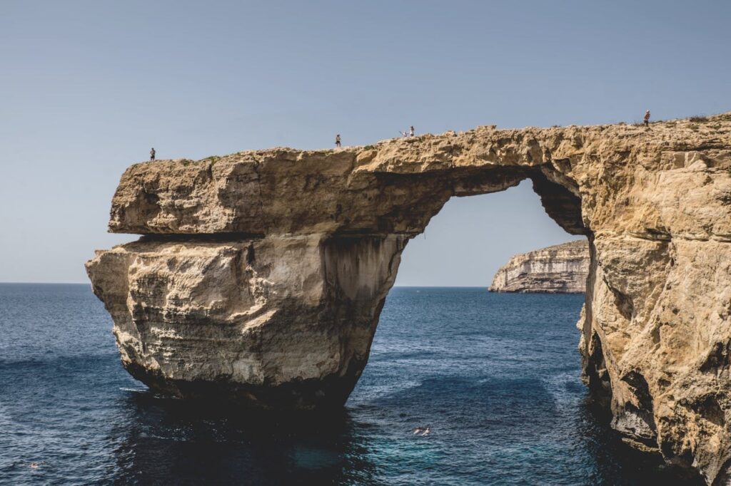 Wide-angle photo of a Cliff on the ocean in Gozo, Malta